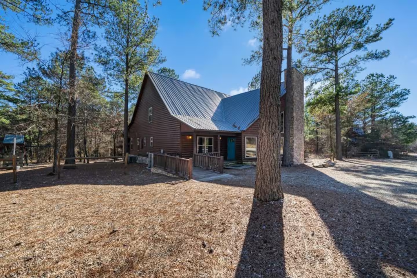 Tucked among the tall pines, this cabin is pure Broken Bow magic