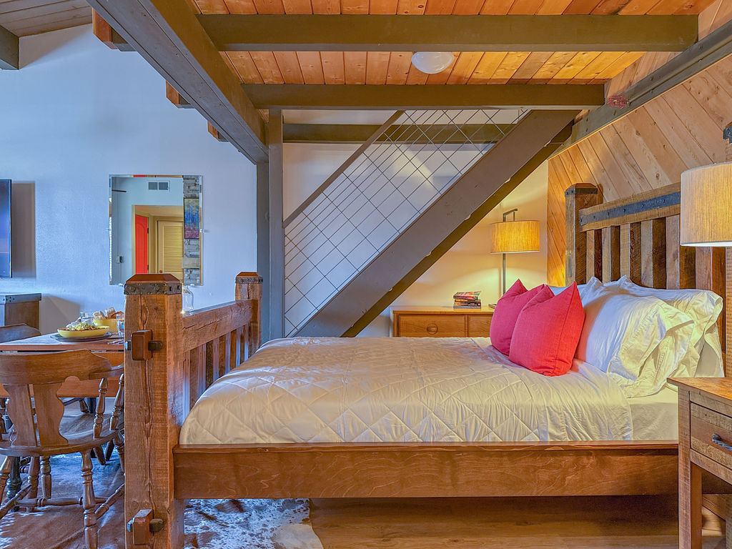 The main level queen bed has a luxury mattress which invites you to a enjoy a beautiful night of rest.