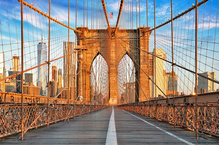 Take a stroll across the Brooklyn Bridge and soak in iconic views, historic architecture, and city energy.