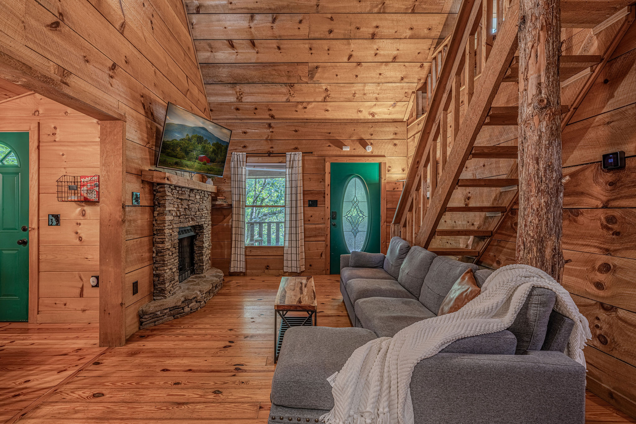 Stone fireplace, loft above, plenty of room to spread out.