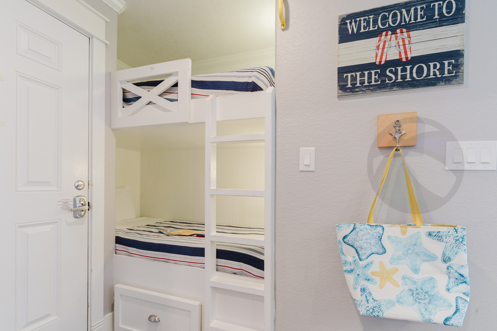 Let's take a tour. From the front door you'll find the true twin bunks with separate lighting and outlets in each