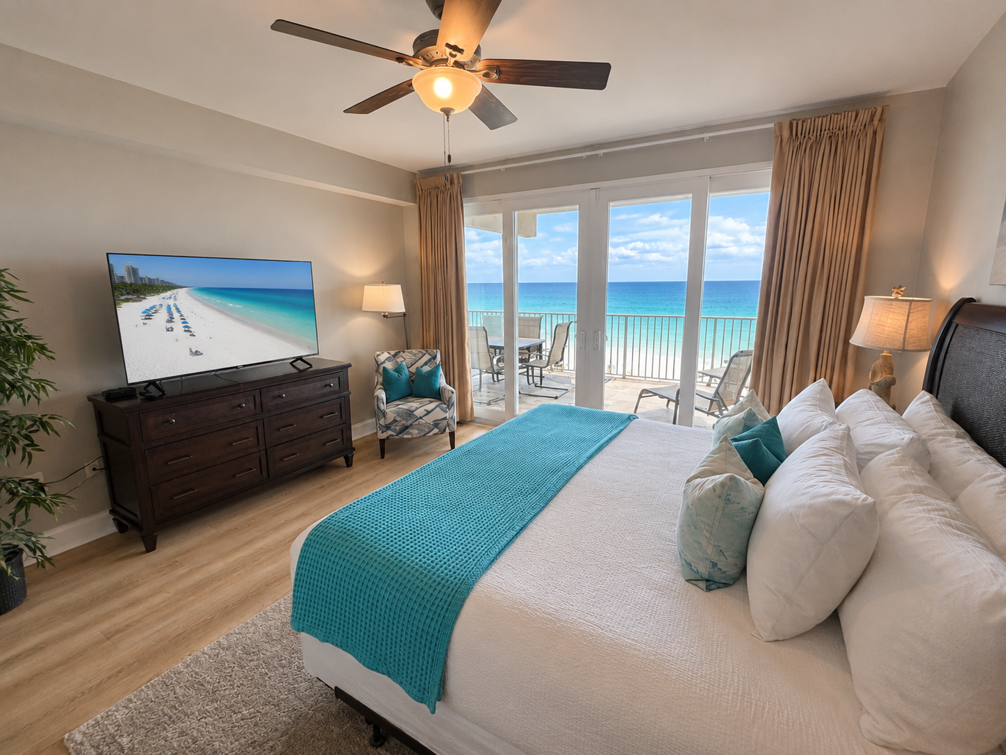 Master bedroom with balcony access and ocean views