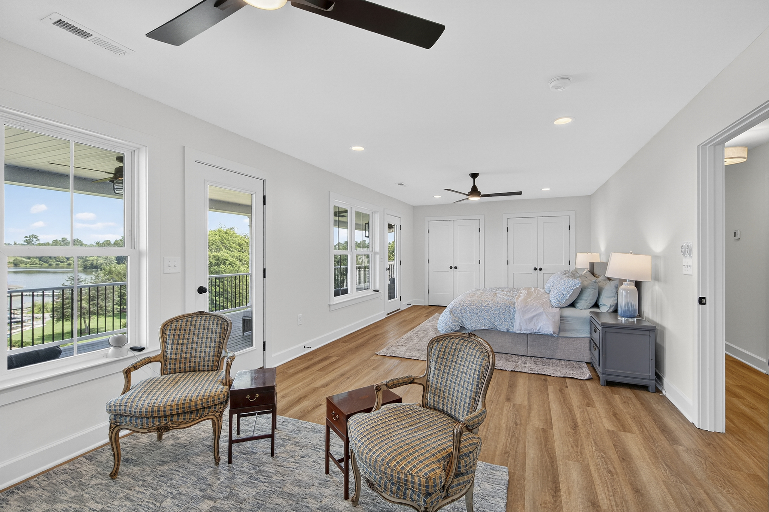 This king suite is perfect for wellness and rest. This room features a Peloton bike, ensuite bathroom, and porch access for morning inspiration.