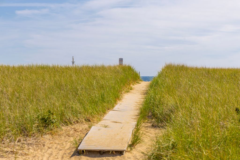 Steps away from the sparkling sea.