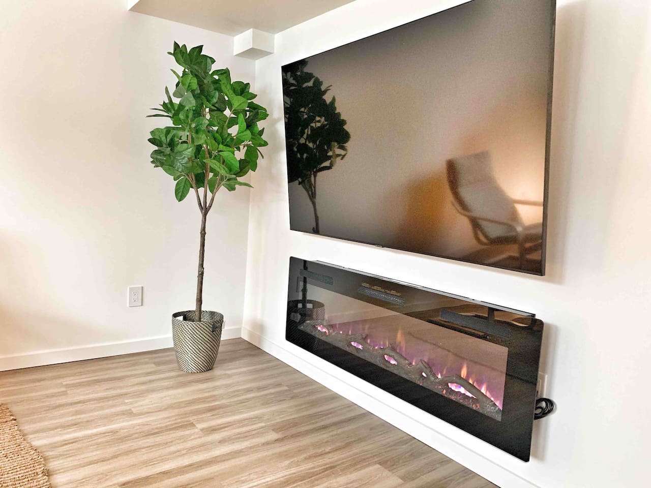 70” HD Smart TV and 60” electric fireplace