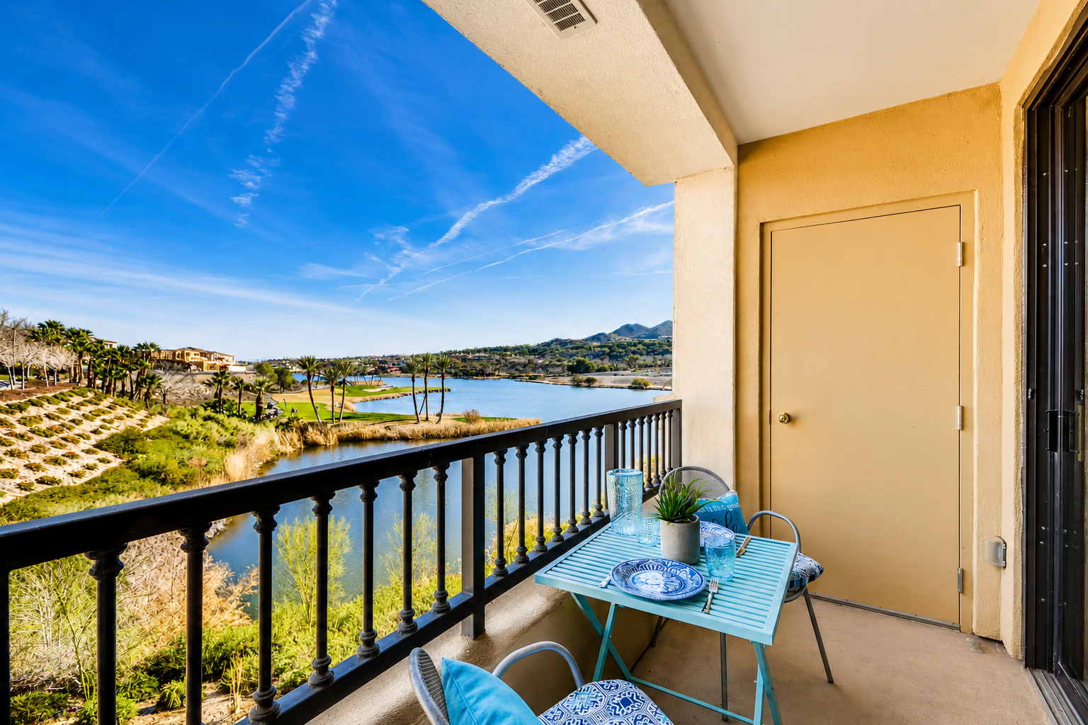 Private balcony with Lake Las Vegas, mountain and golf course views.