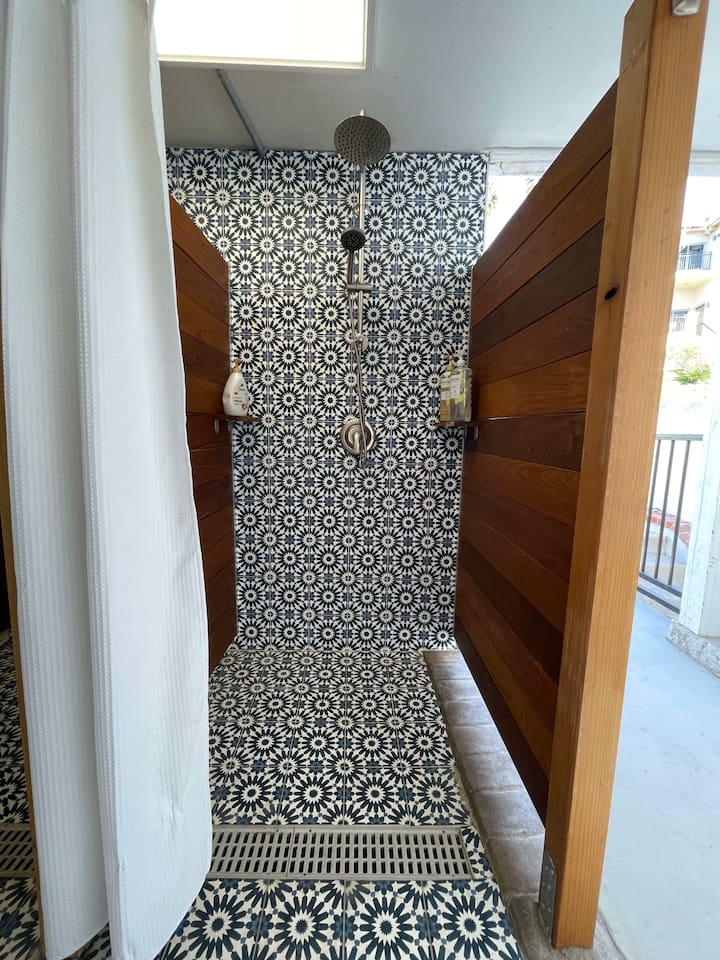 Outdoor showers feel luxurious with softened water and fresh air