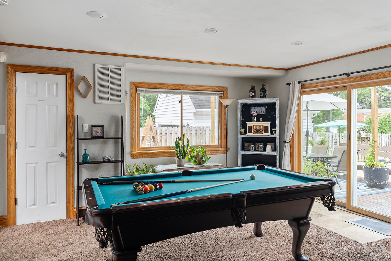 Living Room: Enjoy pool tournaments with scenic views and chic decor in every corner!