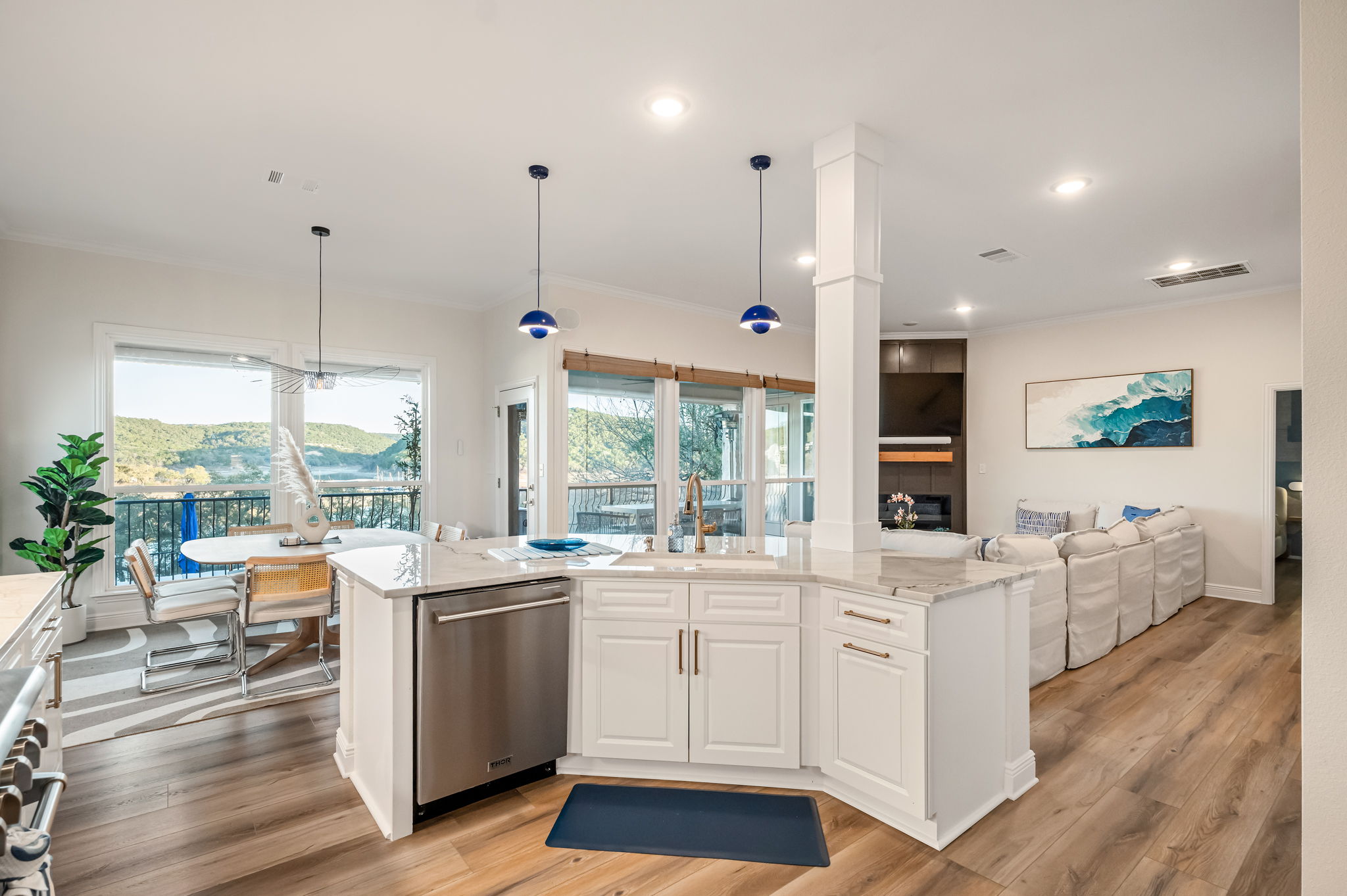 Bright open-concept kitchen with large island — perfect for group cooking and gathering.