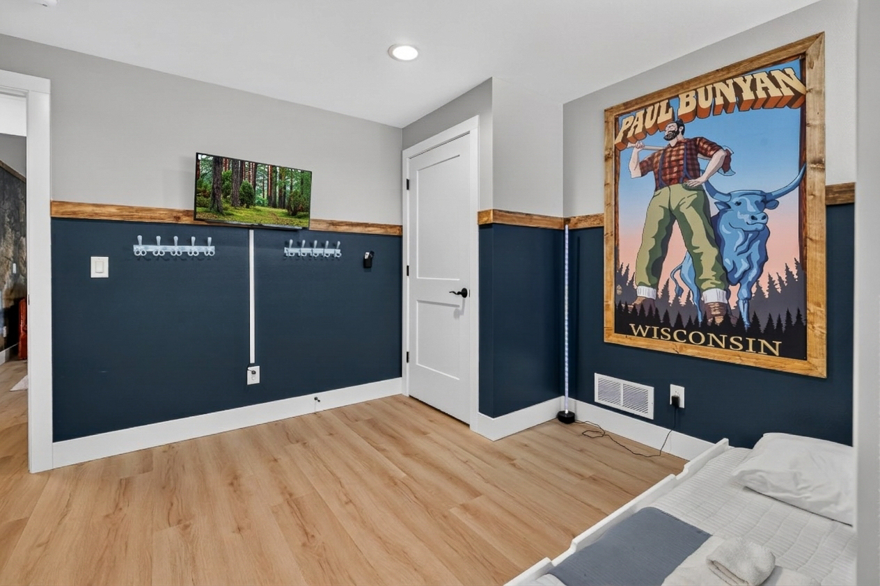 Downstairs kids bunk room that sleeps five and has a smart tv