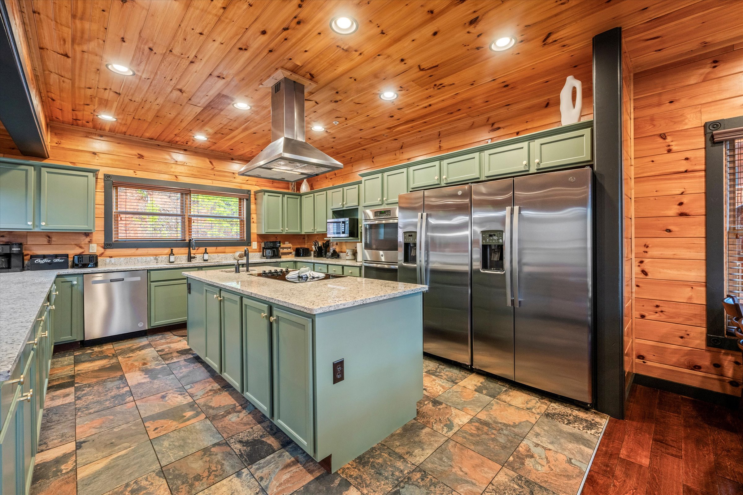 The kitchen has 2 large refrigerators with filtered water and ice dispensers.
