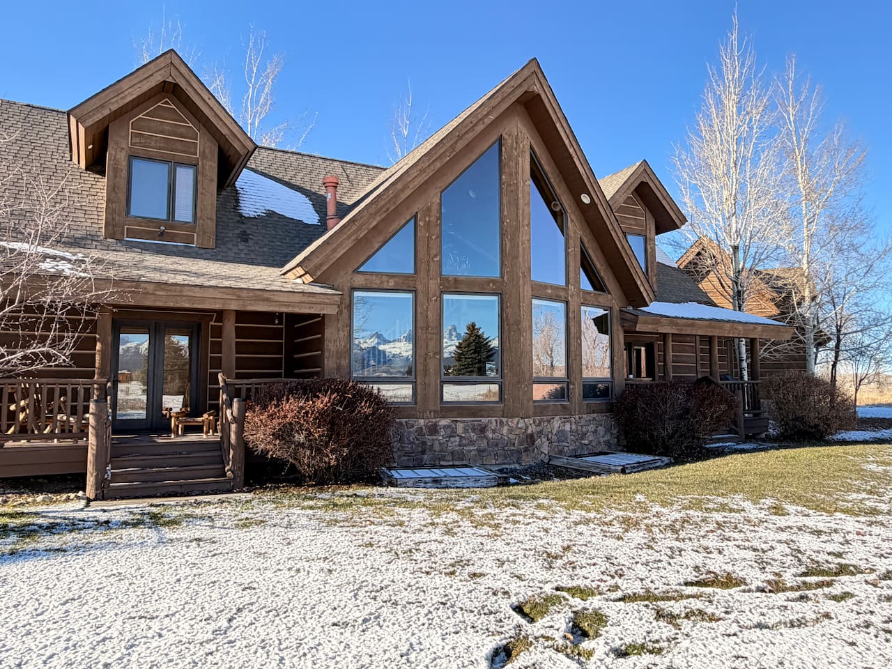On clear days, the windows reflect the breathtaking Teton range—look closely and you can even spot the iconic Grand Teton.