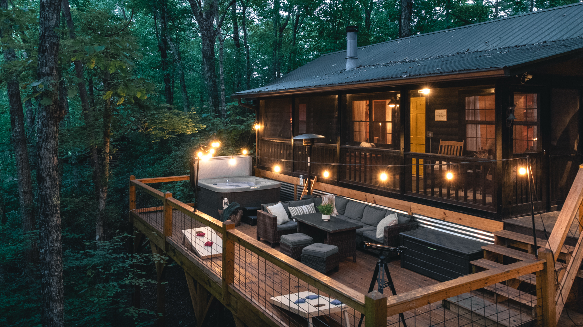 Relax under the trees on the large outdoor deck