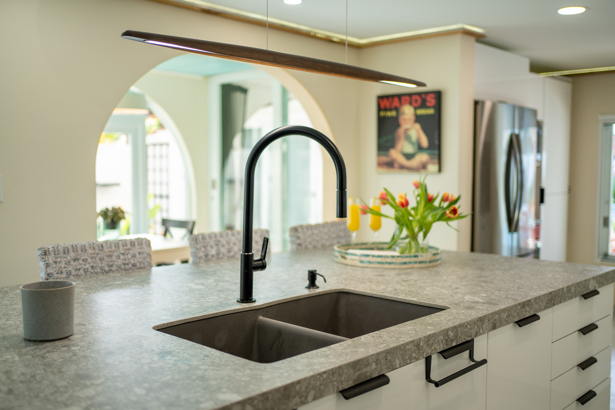 The is view features our Island with double sink and 3 stools for gathering around in Dorado, Puerto Rico.