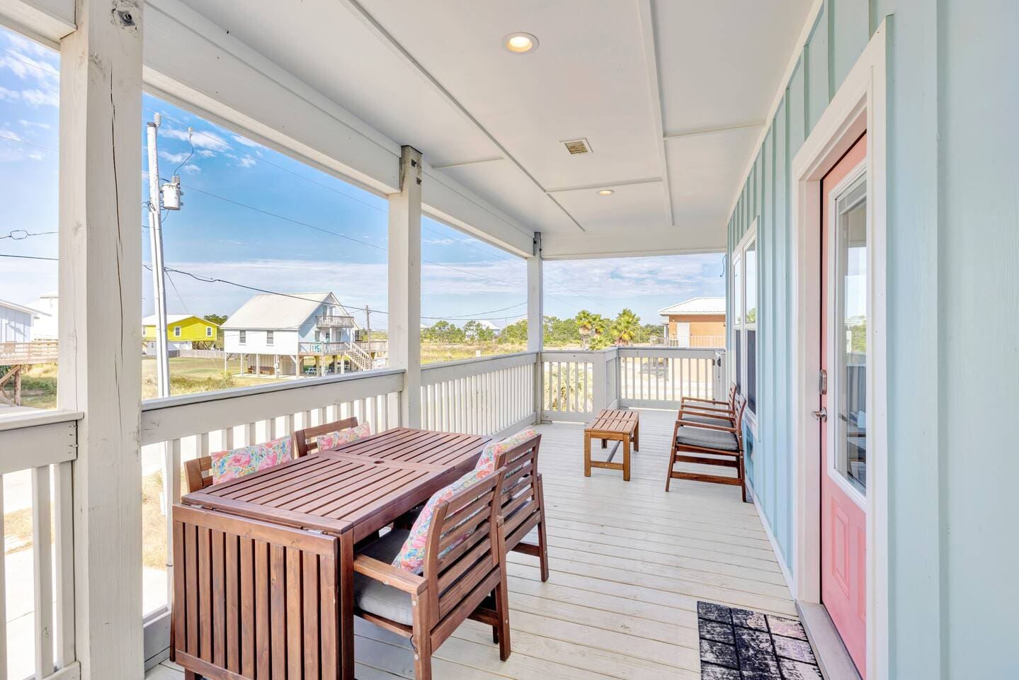 Outdoor dining on front covered porch