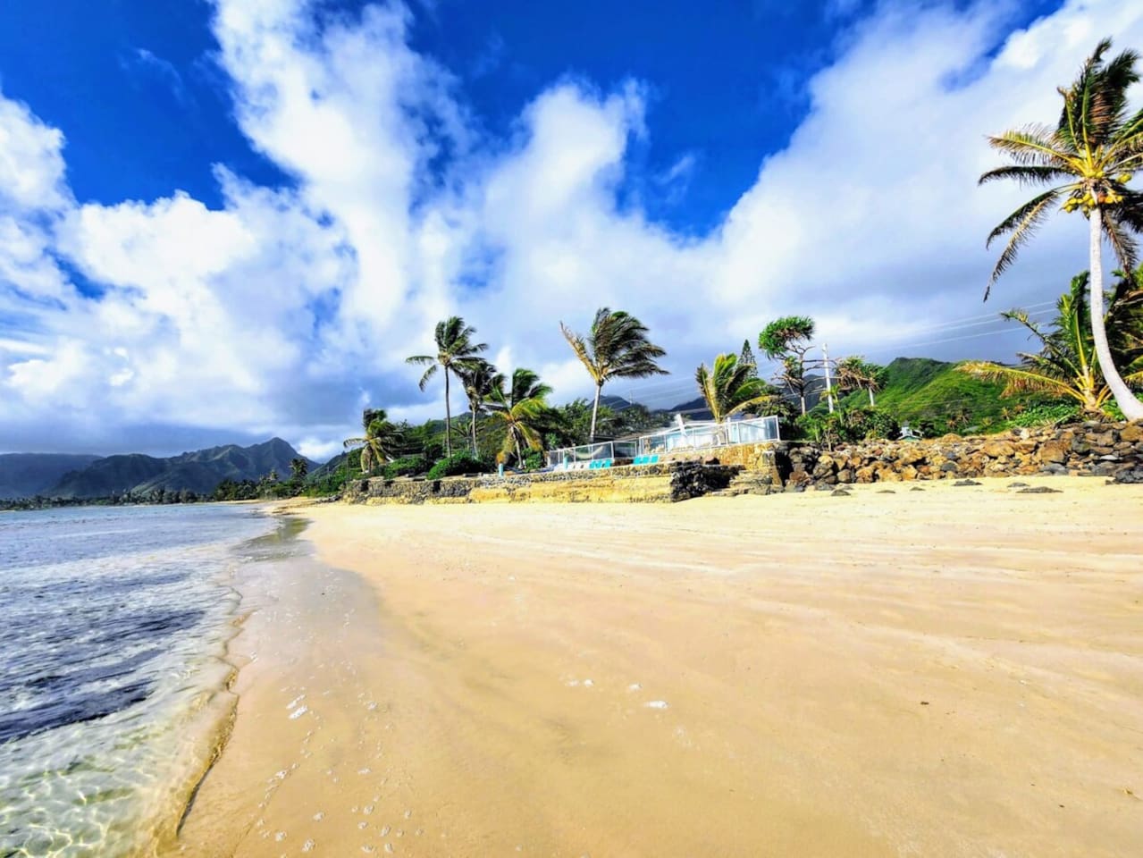 This picture was taken with a CELL PHONE and not a professional camera! Corner Beachfront Estate with its own private beach and cove.