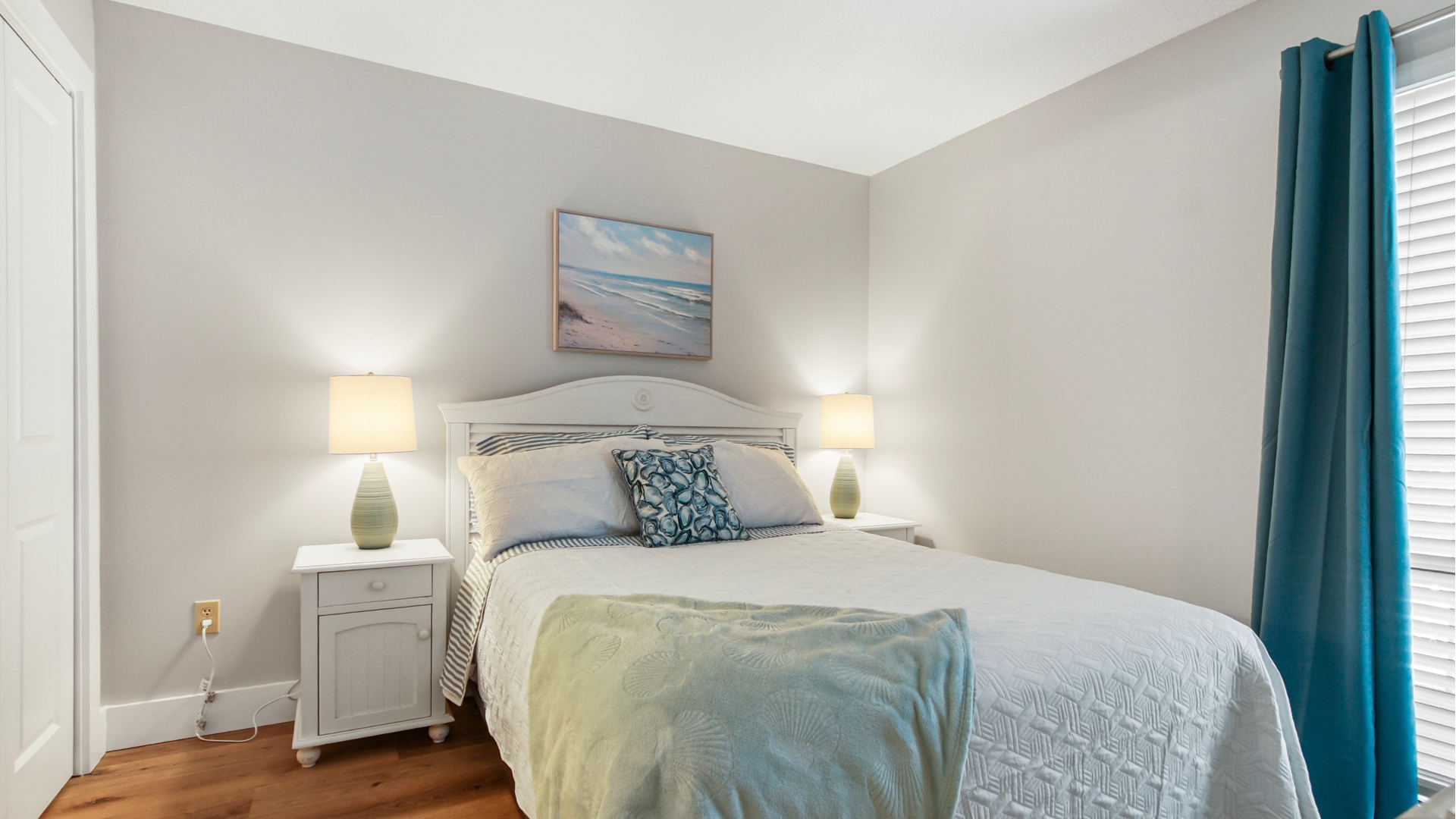 Second bedroom with queen bed, and bathroom access