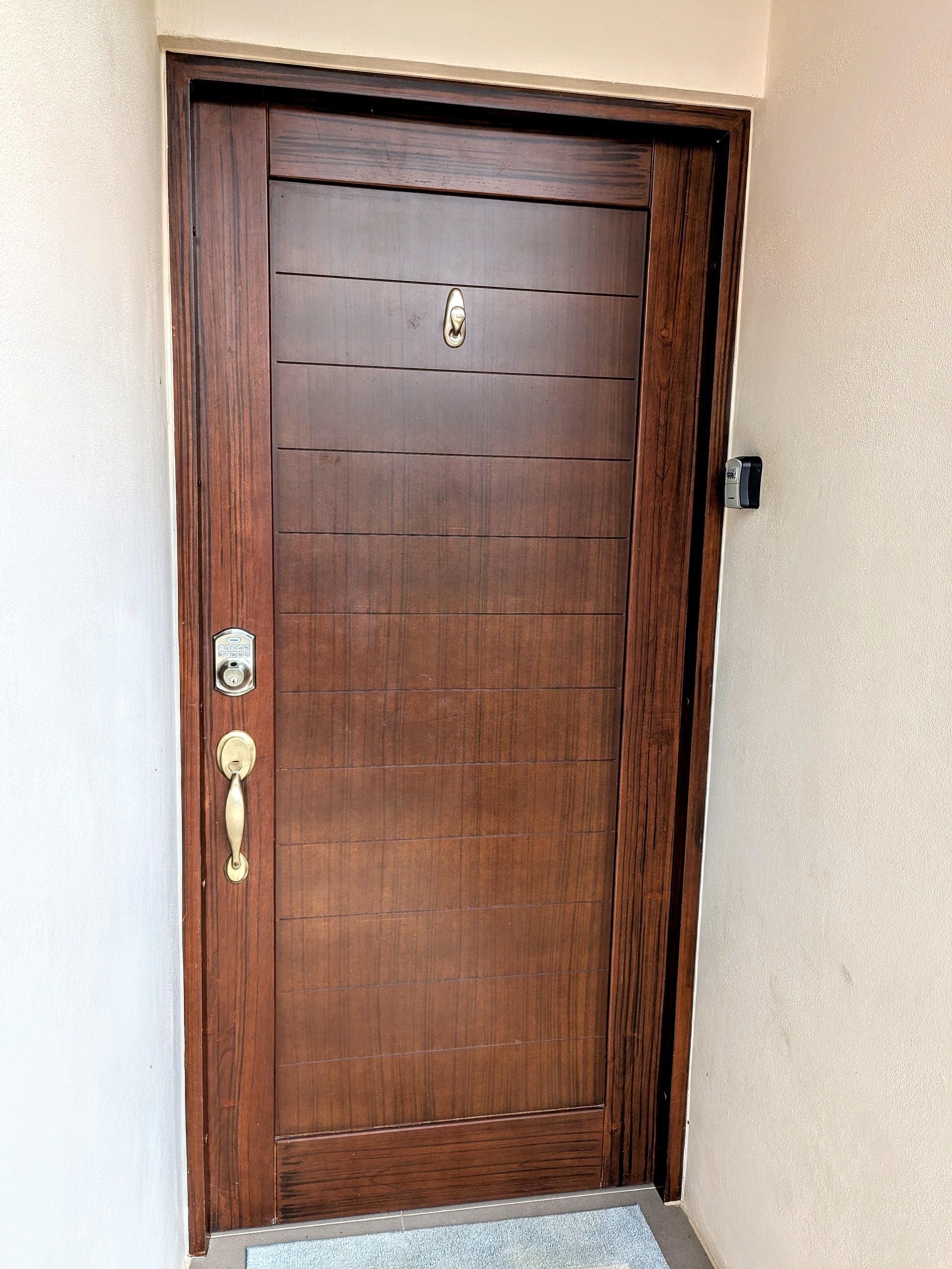 Front entry door with lock box key access