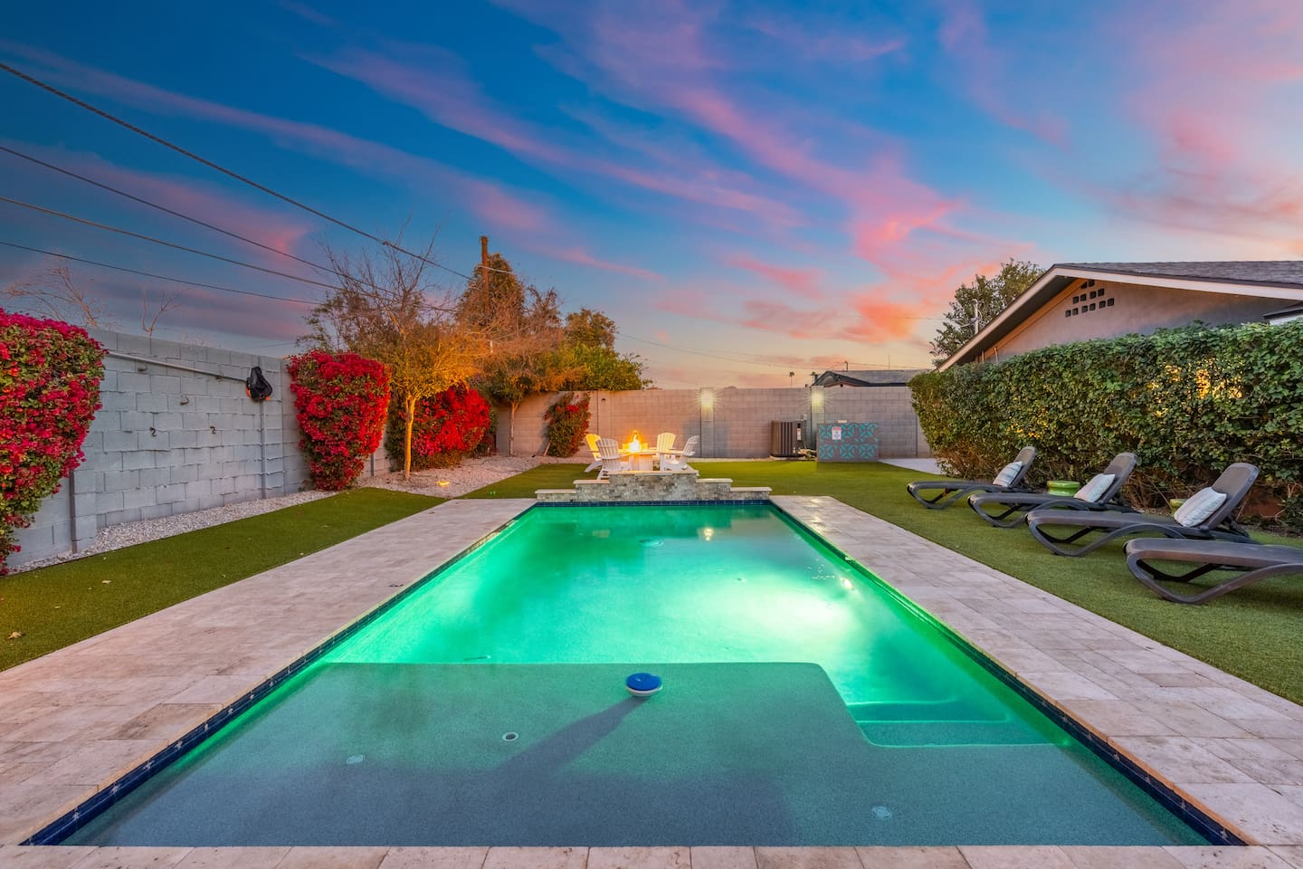 Lit by soft, ambient lighting, creating a calm and magical atmosphere perfect for evening swims or relaxation.