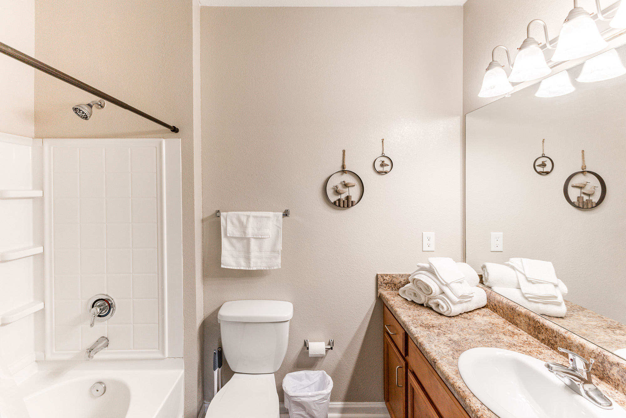 bathroom with bath towels, hand towels and wash cloths