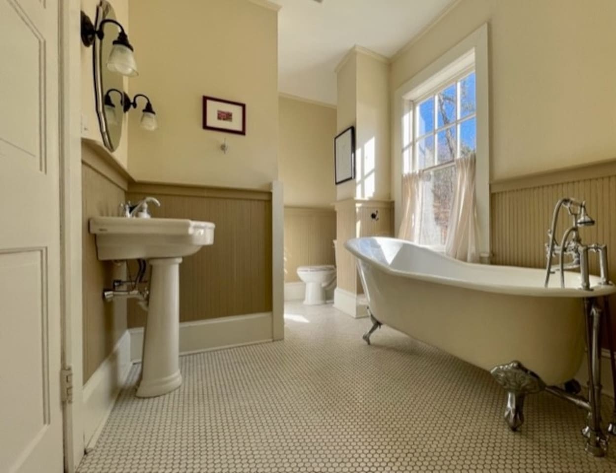 Upstairs Bathroom one...there is a shower on the other side of the wall from the sink