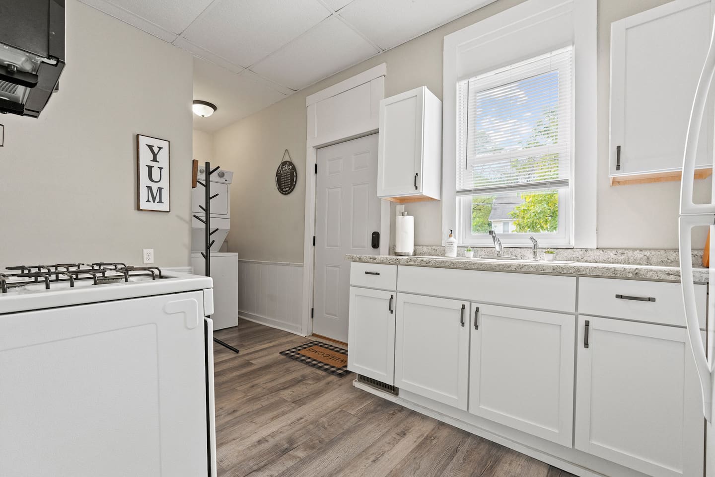 Prepare delicious meals in the kitchenette with a refrigerator, stove, and essential cooking tools.