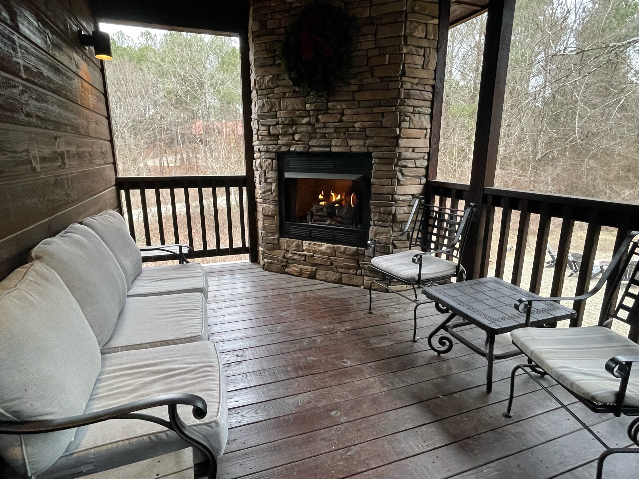 No matter what the weather is like, you will absolutely love the peacefulness of the back patio overlooking the back yard fire pit and gaming area.