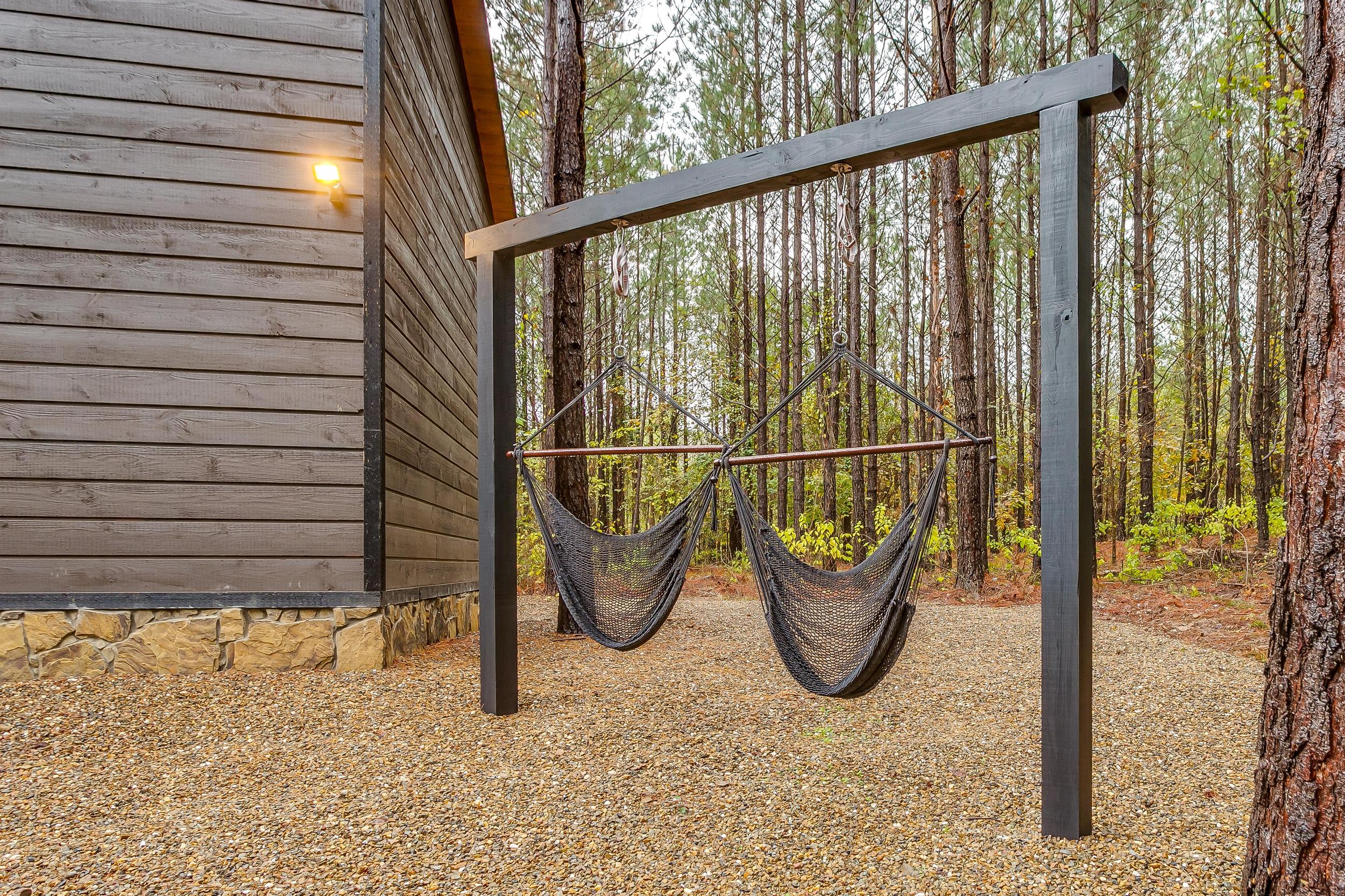 Adults and children can enjoy the firepit from the swings