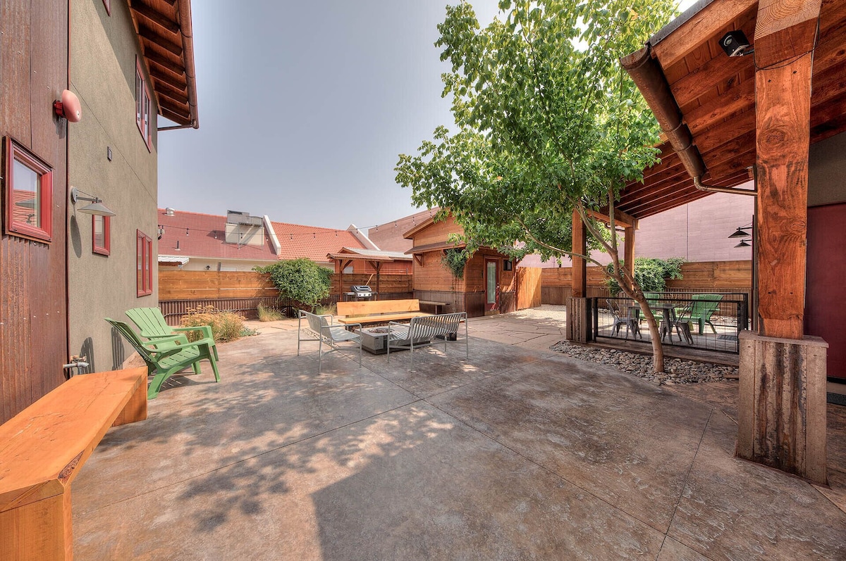 Common area with fire pit, sitting area, BBQ, and dry sauna