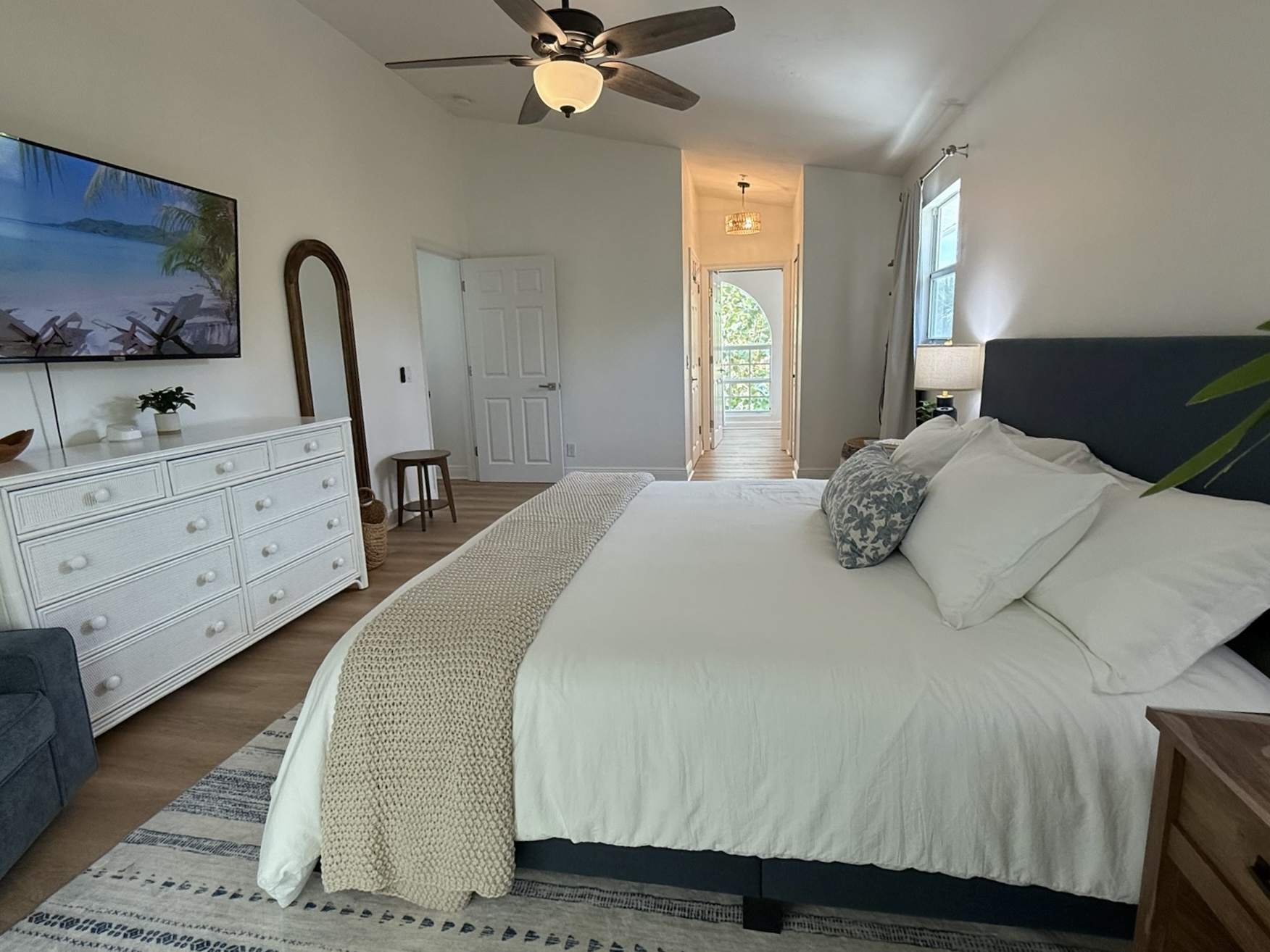 Master King Bedroom on the main level with large TV and private balcony