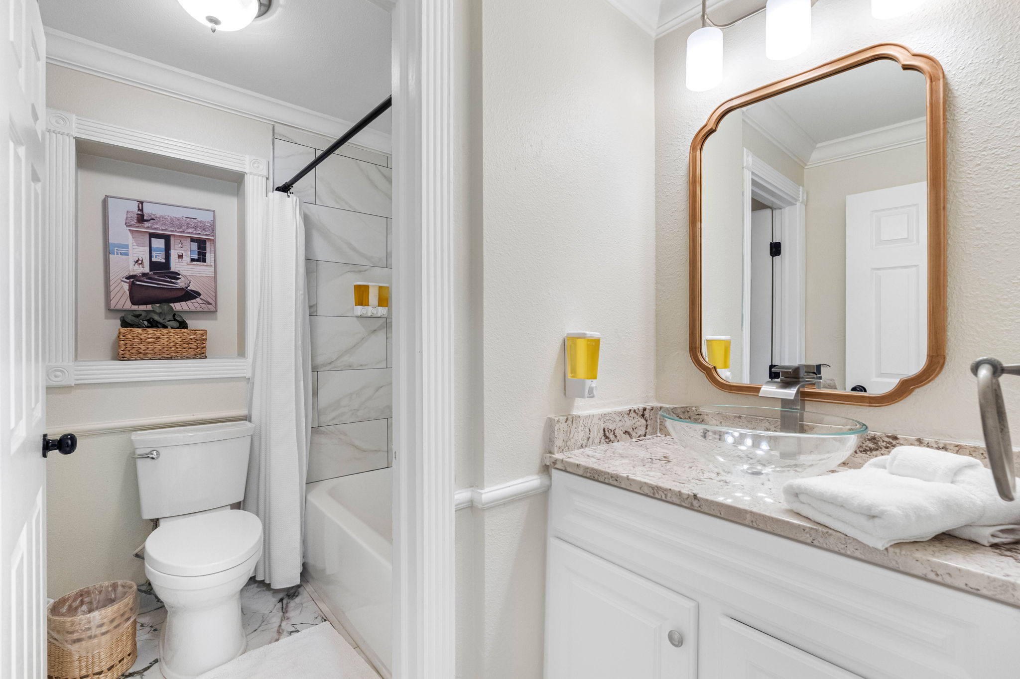 The modern design combines sleek finishes with practical elements, offering a calming and luxurious environment for daily routines.
