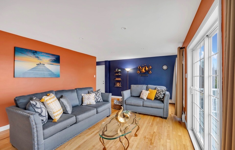 Living Room with Smart TV and deck access