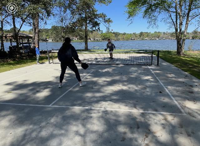 Playing Pickleball on the neighborhood court.