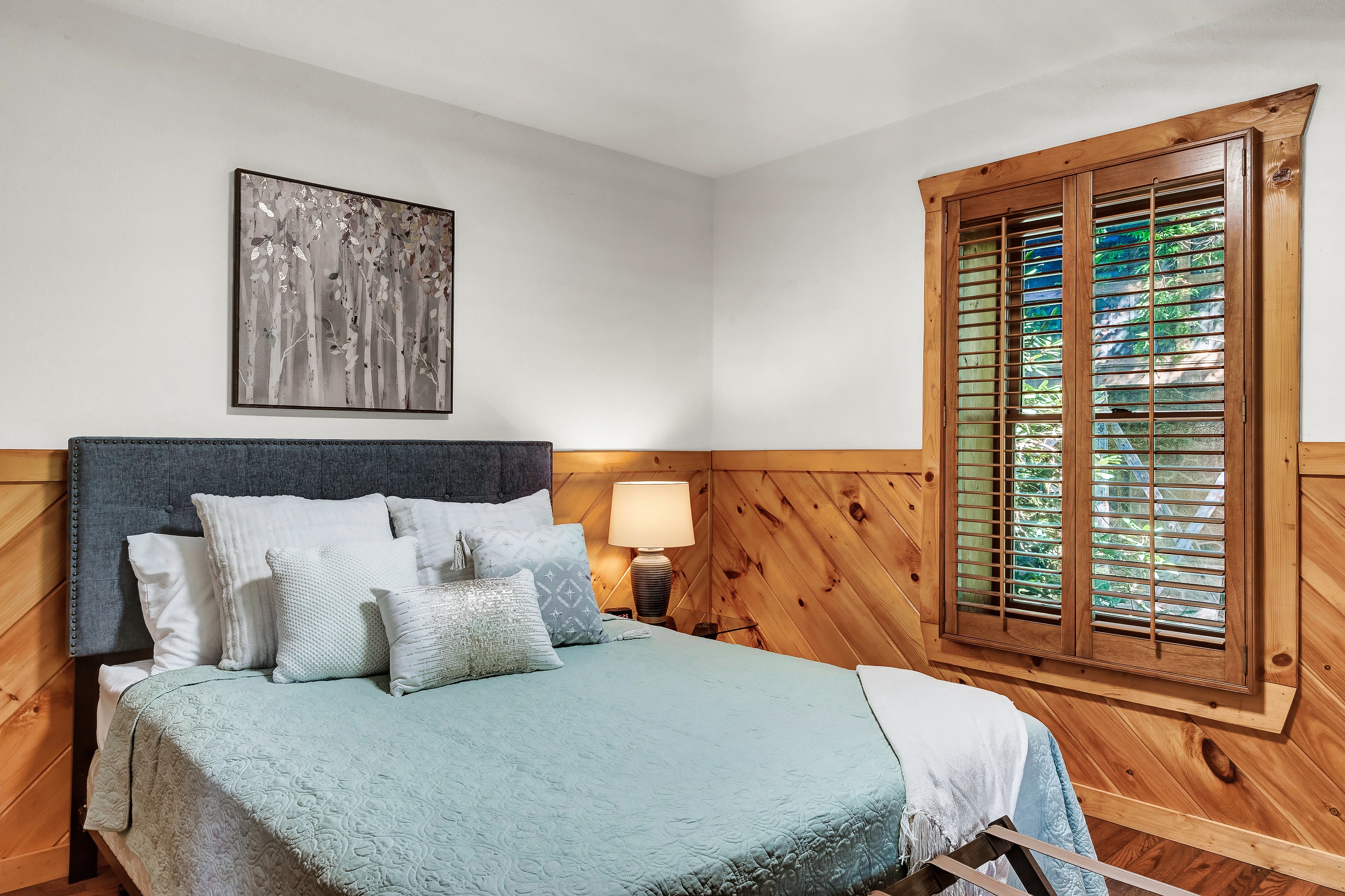 Lower floor with welcoming queen bed.
