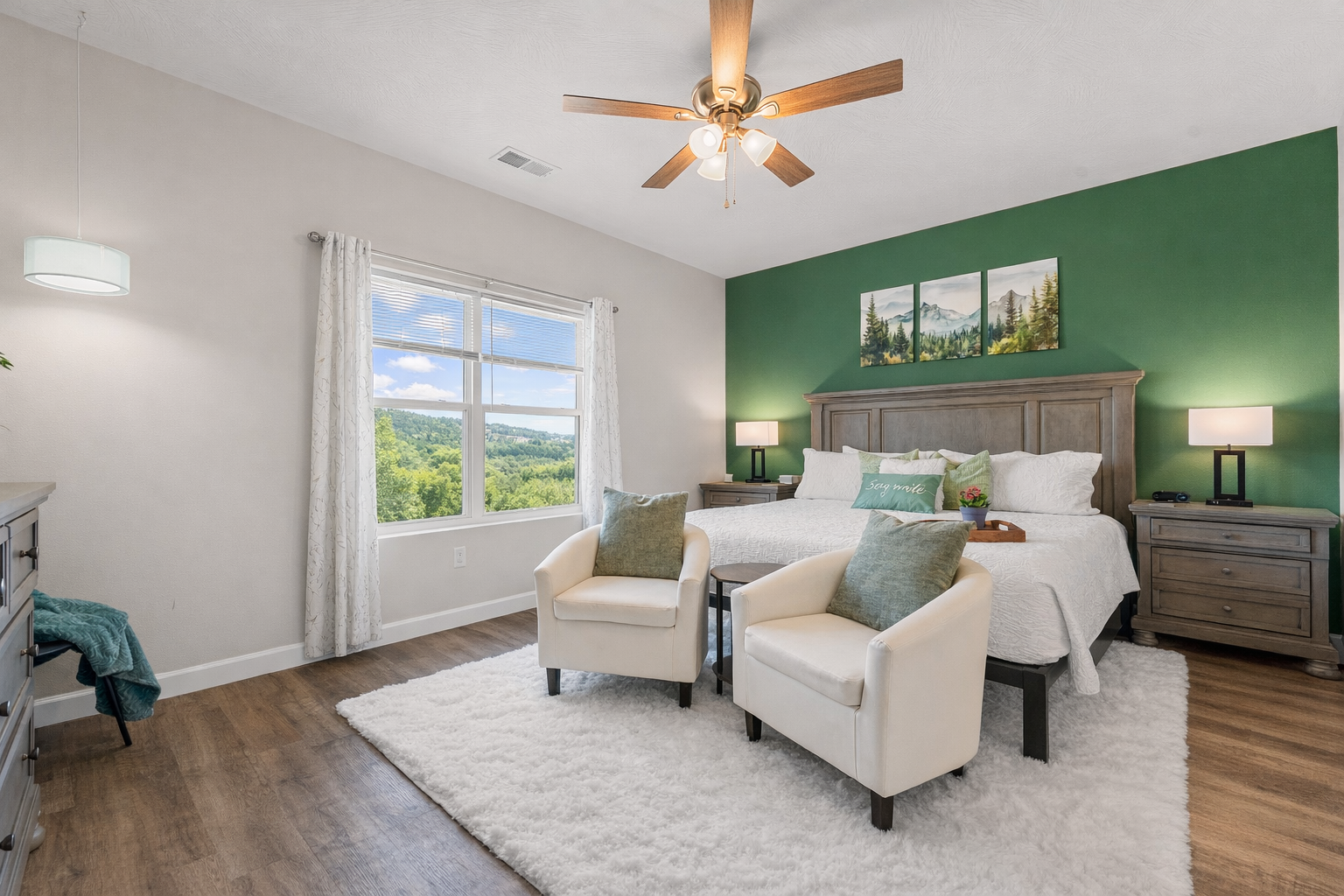 Steal a quiet, private moment together before the kids wake or after bedtime. Unwind in the king en suite—a serene retreat with elegant touches and beautiful views that invite you to slow down, relax, and let down. Now this...is vacation.