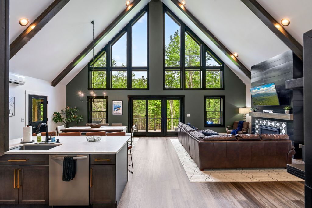 Living the A-frame dream!  Soaring ceilings and stunning scenery make this cabin the perfect mountain escape. 