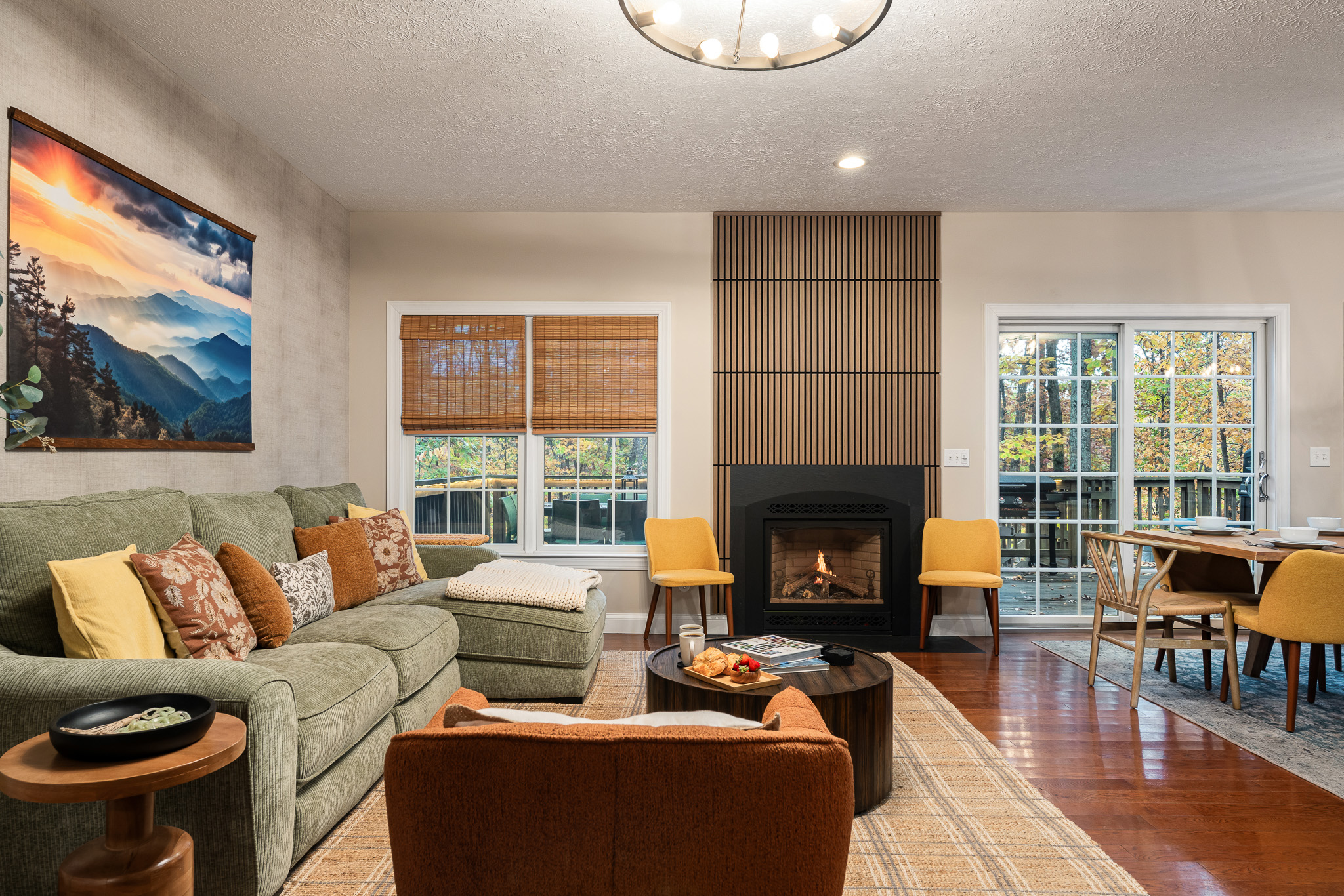 Relax in style — sink into the oversized sectional, admire the mountain views (inside and out), and enjoy movie marathons or quiet nights in.