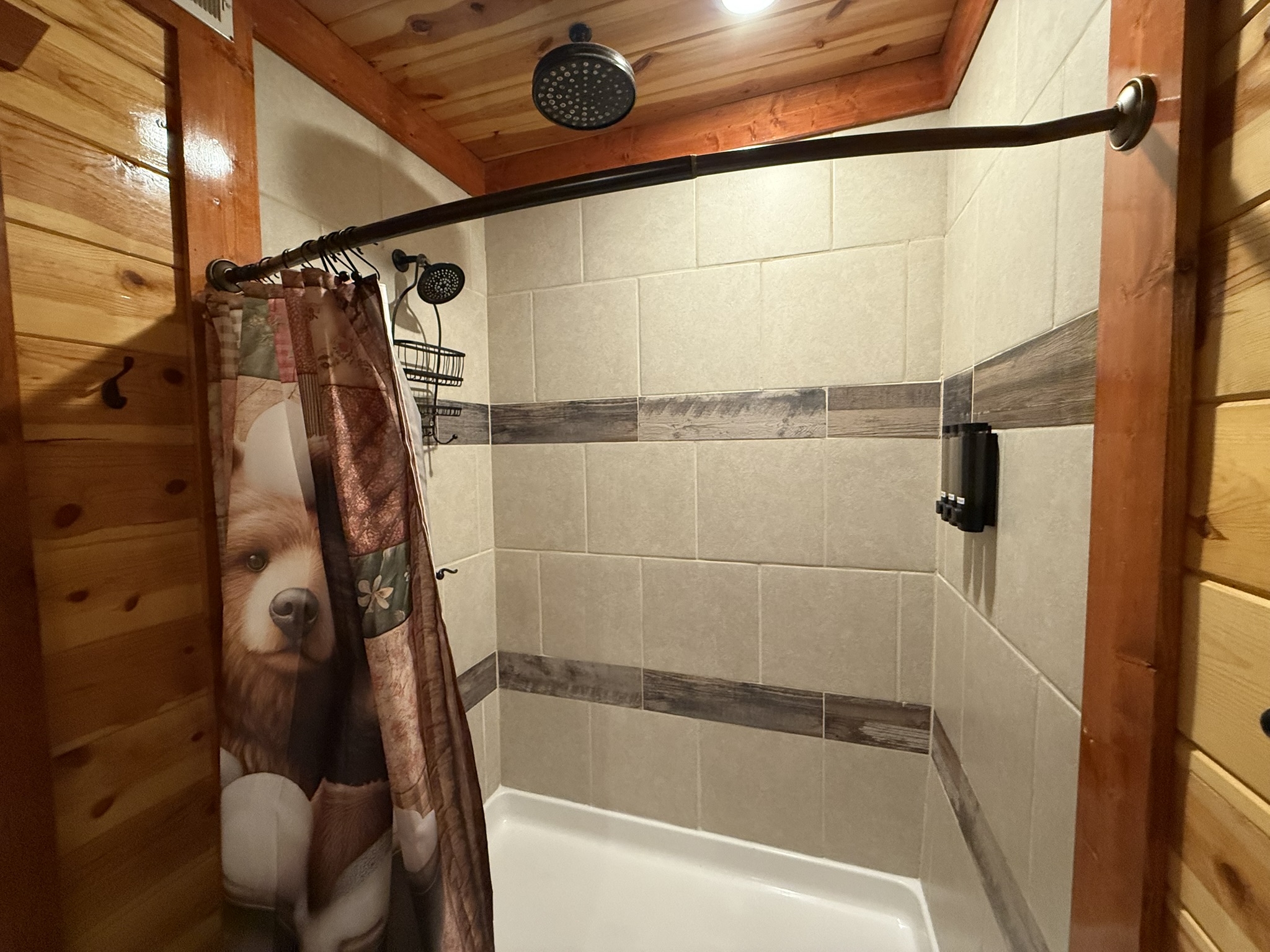 Even the bunkroom ensuite bathroom features a luxurious dual rainfall shower.