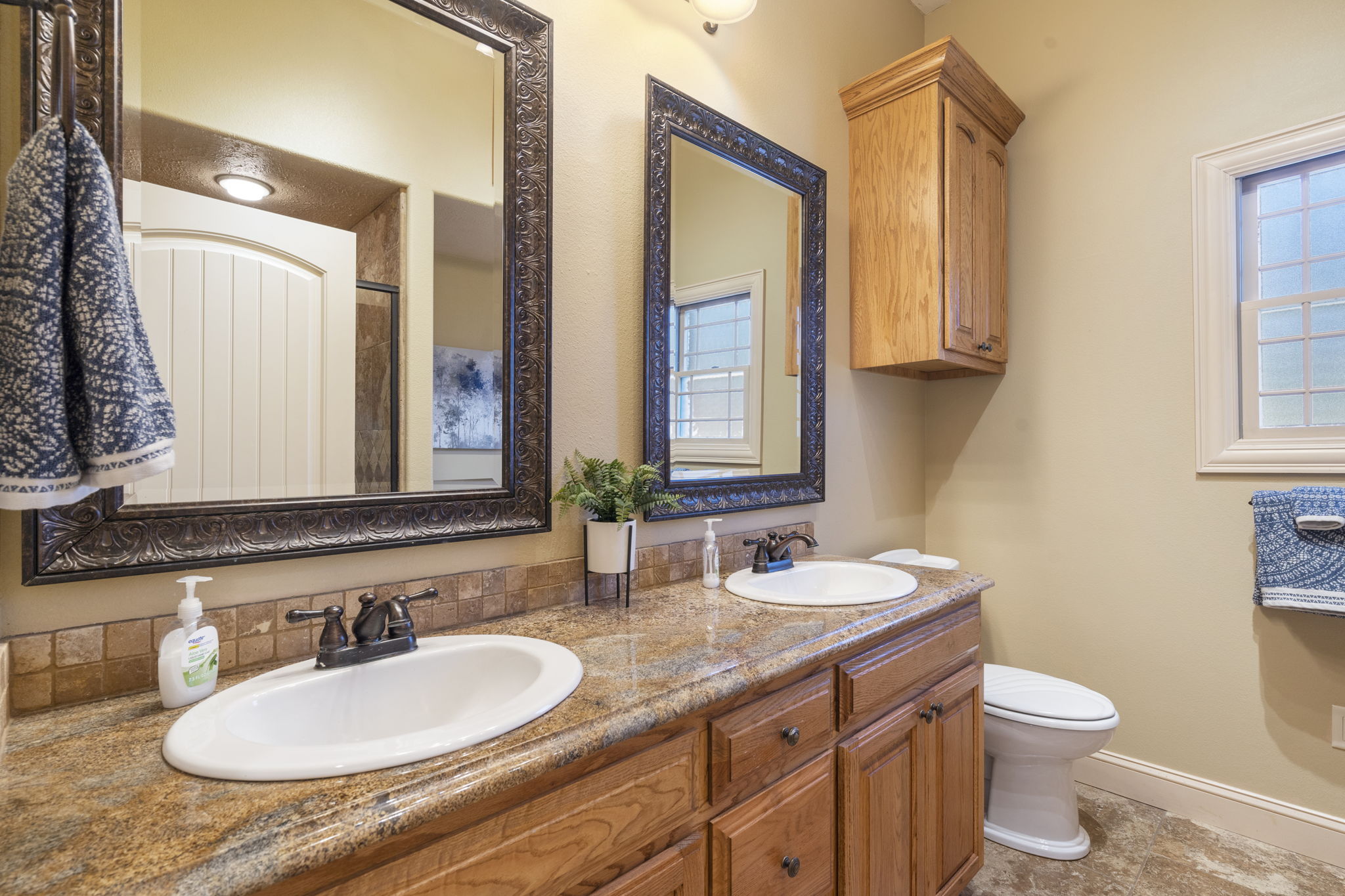 Main level guest bathroom shared between King #2 and King #3