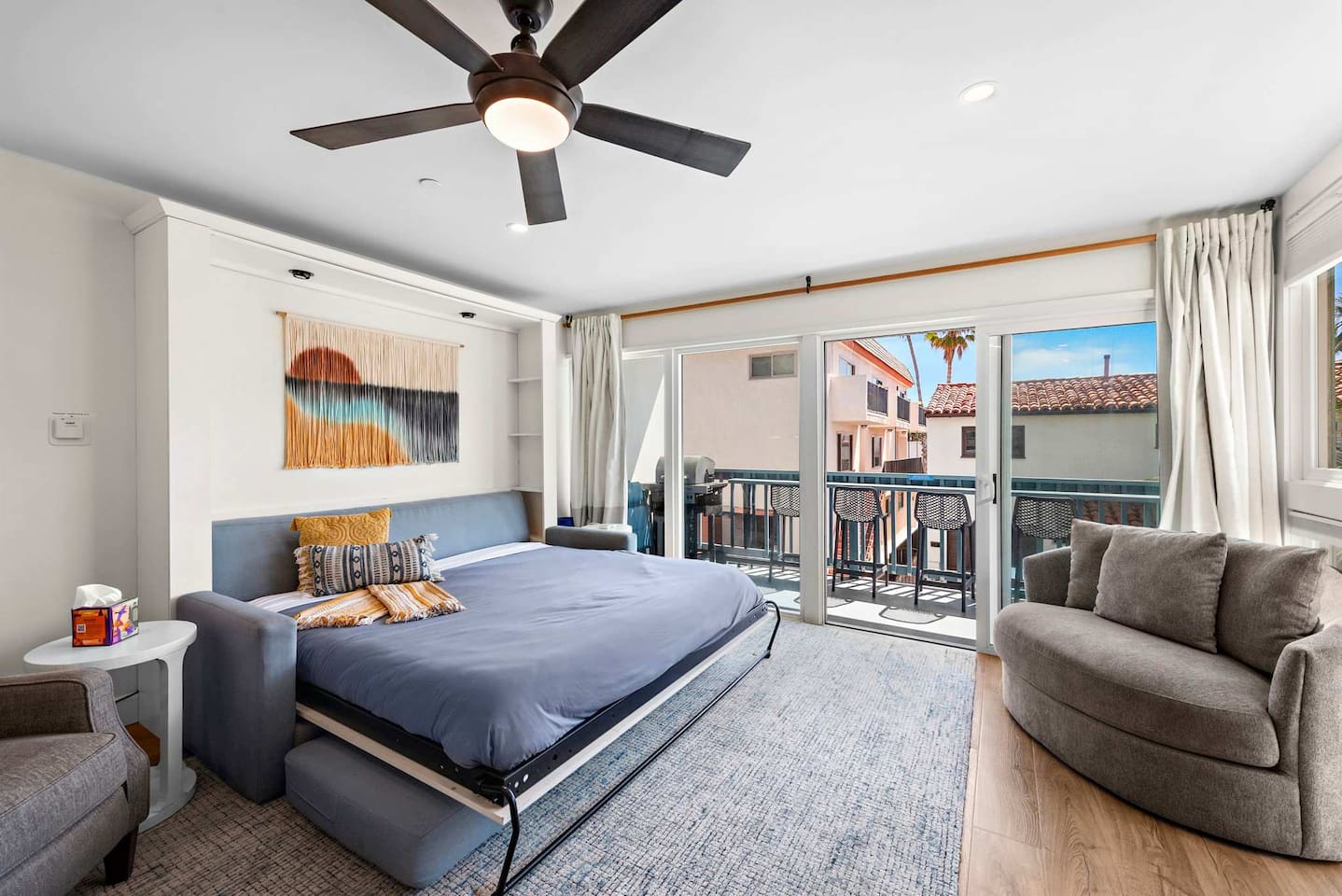 Here is the murphy bed extended in relation to the rest of the room.  This is a STUDIO UNIT (without a separate bedroom) so this is the primary bed (other than sleeper ottoman twin bed)