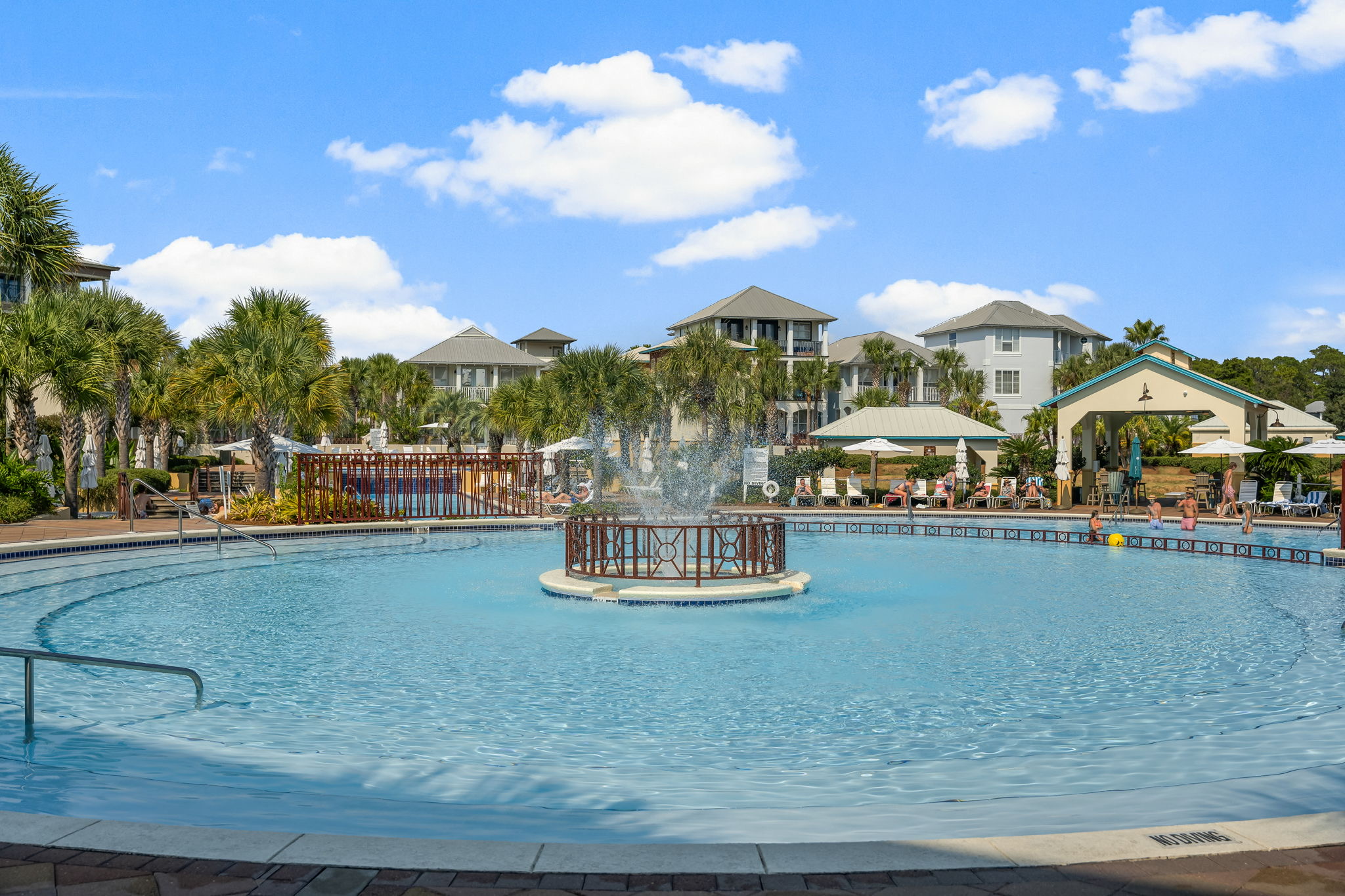 Find your zen by the fountain. Relaxation comes standard at the 1200 sq ft Seacrest Beach community pool just steps away.