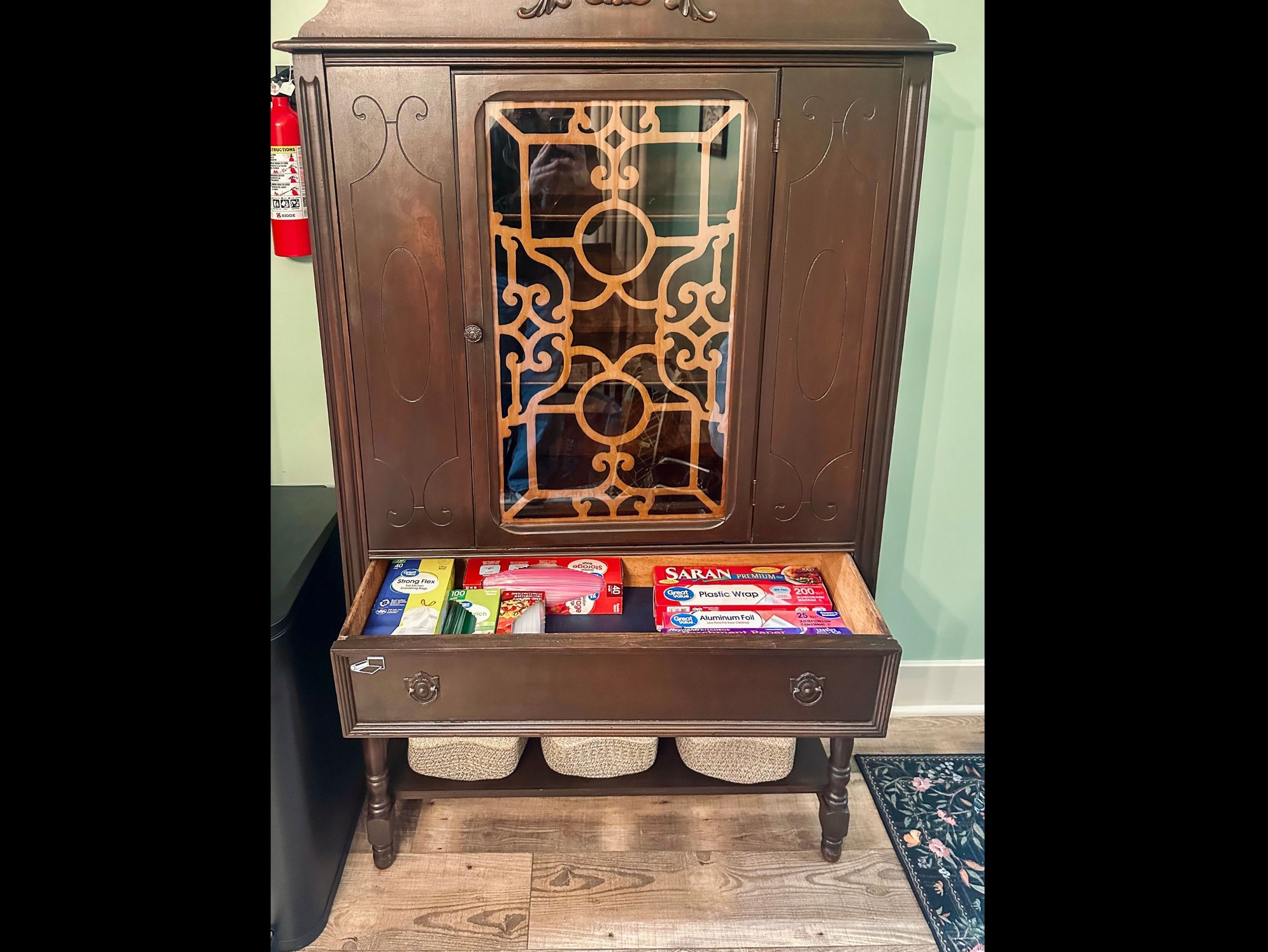 Pantry drawer organized with trash bags, plastic wrap, wax paper, foil, and food storage bags to make extended stays simple and convenient.