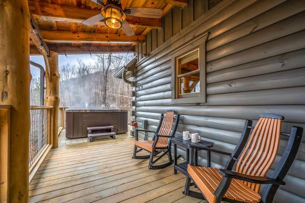 The covered porch at Bear Paws Cabin is your family