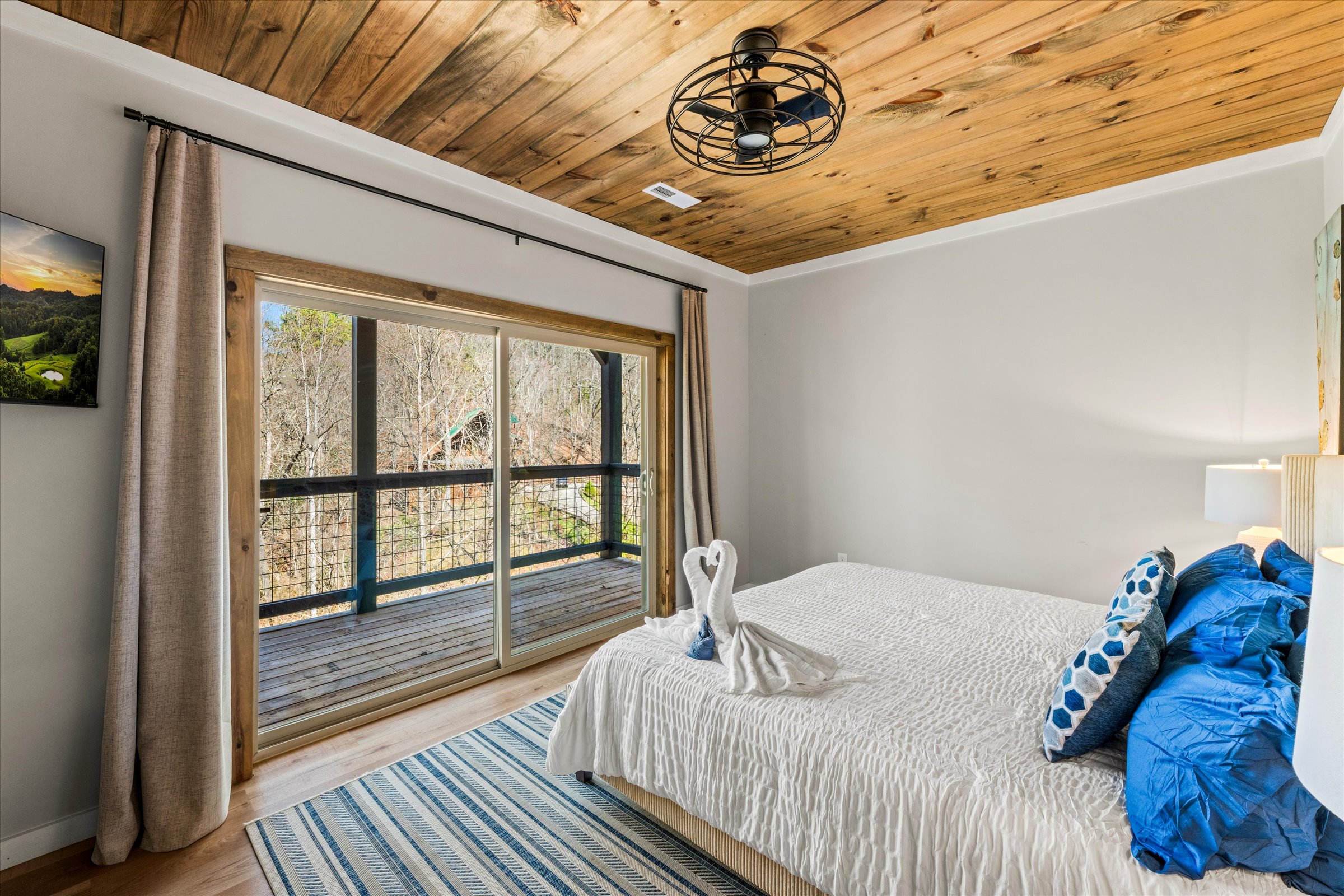 Sink into the plush king bed after a long day and enjoy the breeze from the adjacent balcony.