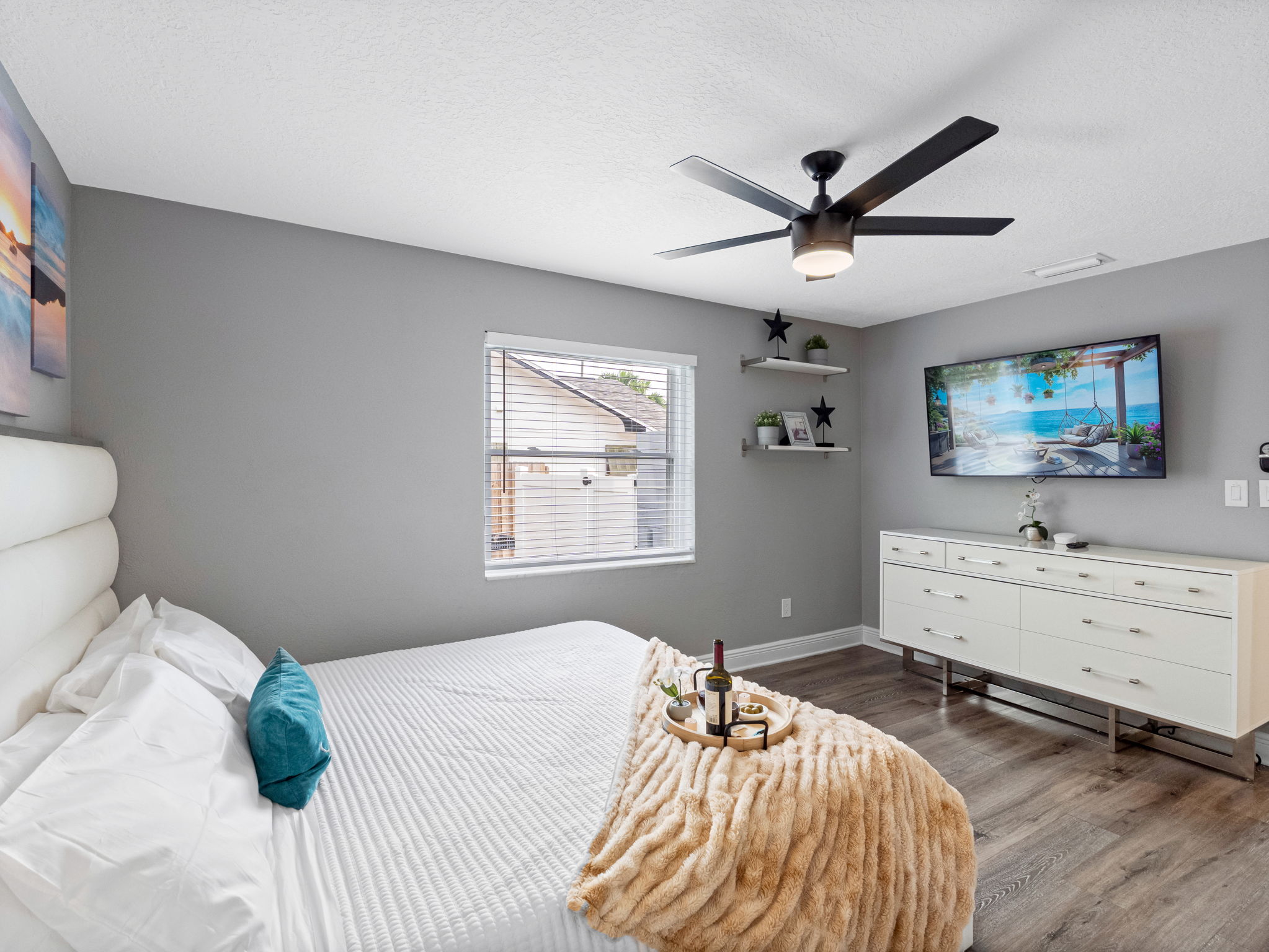 Minimalist lines meet warm tones and textures, making this bedroom both elegant and incredibly comfortable.