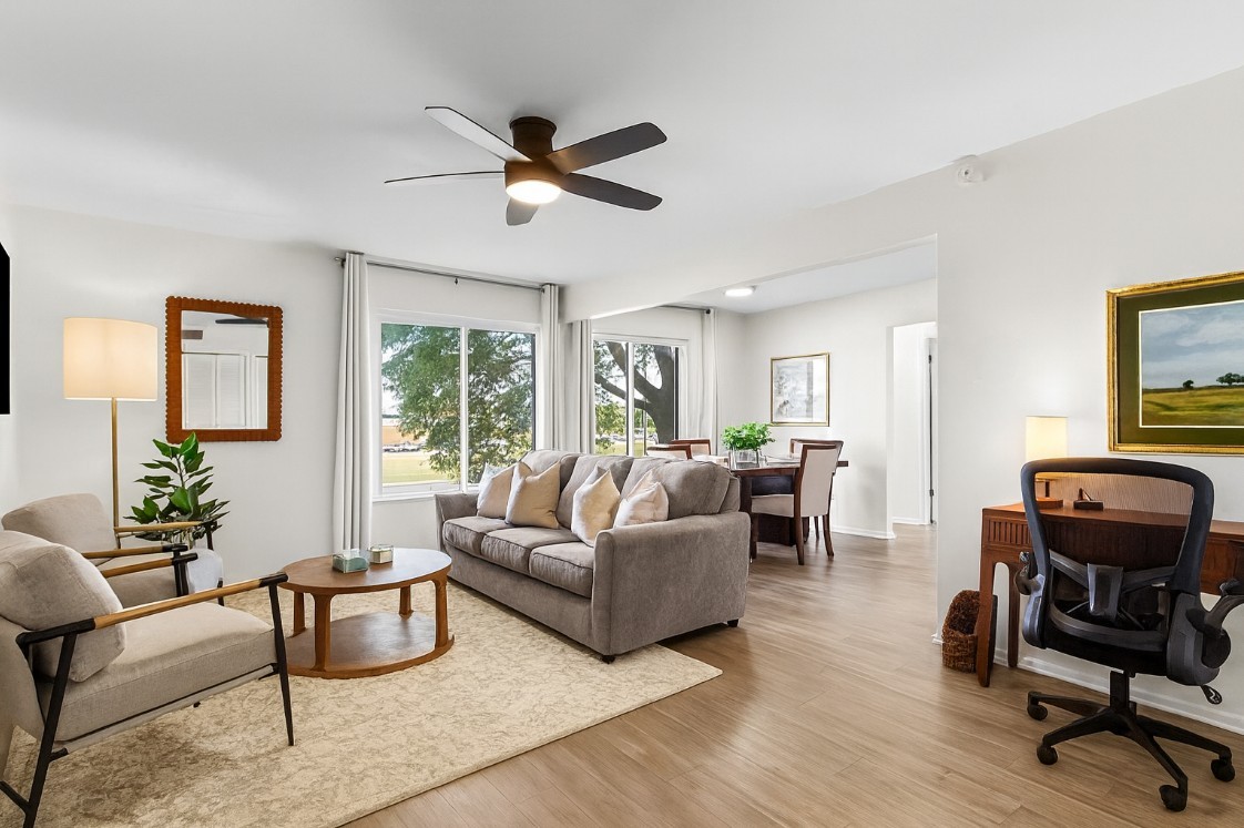 Spacious open-concept living room with stylish décor and direct access to your private entrance.