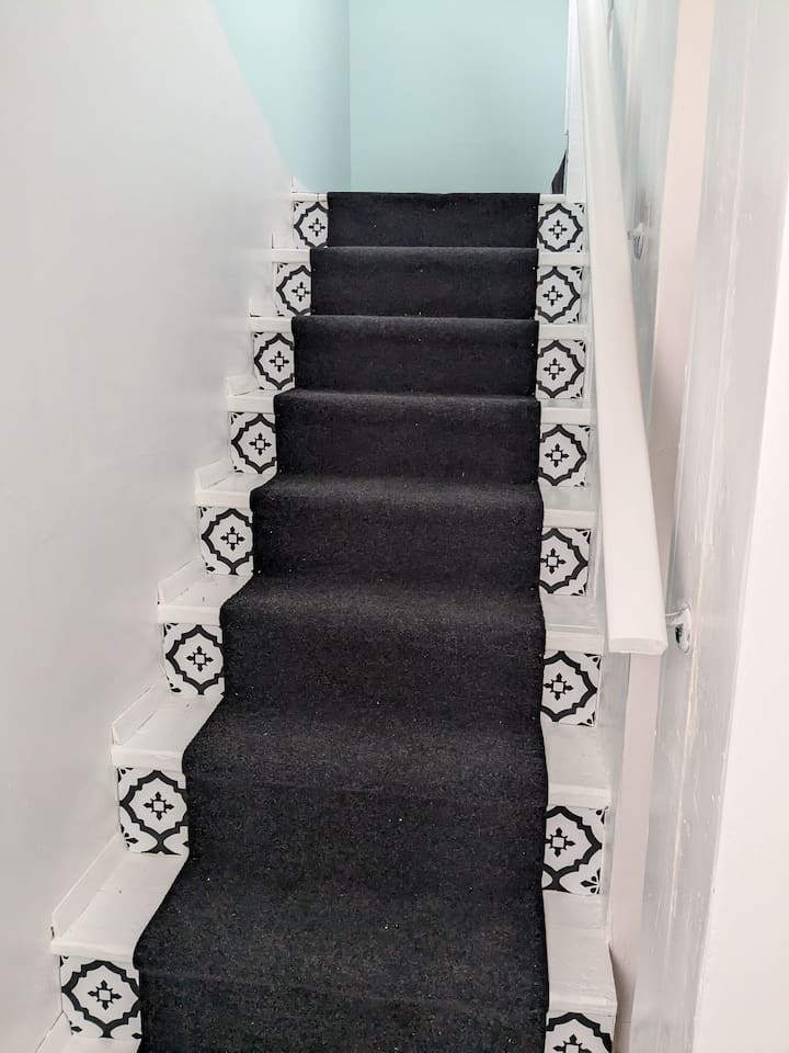 Livingroom, kitchen and bathroom are up the stairs.