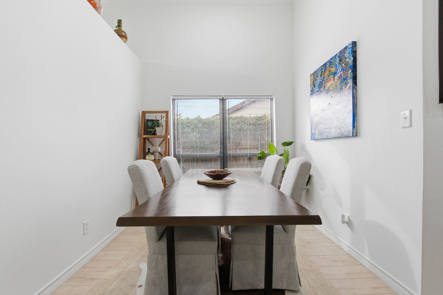 Dining area with seating for four, perfect for family meals, game nights, or remote work with fast WiFi and easy access to the full kitchen.