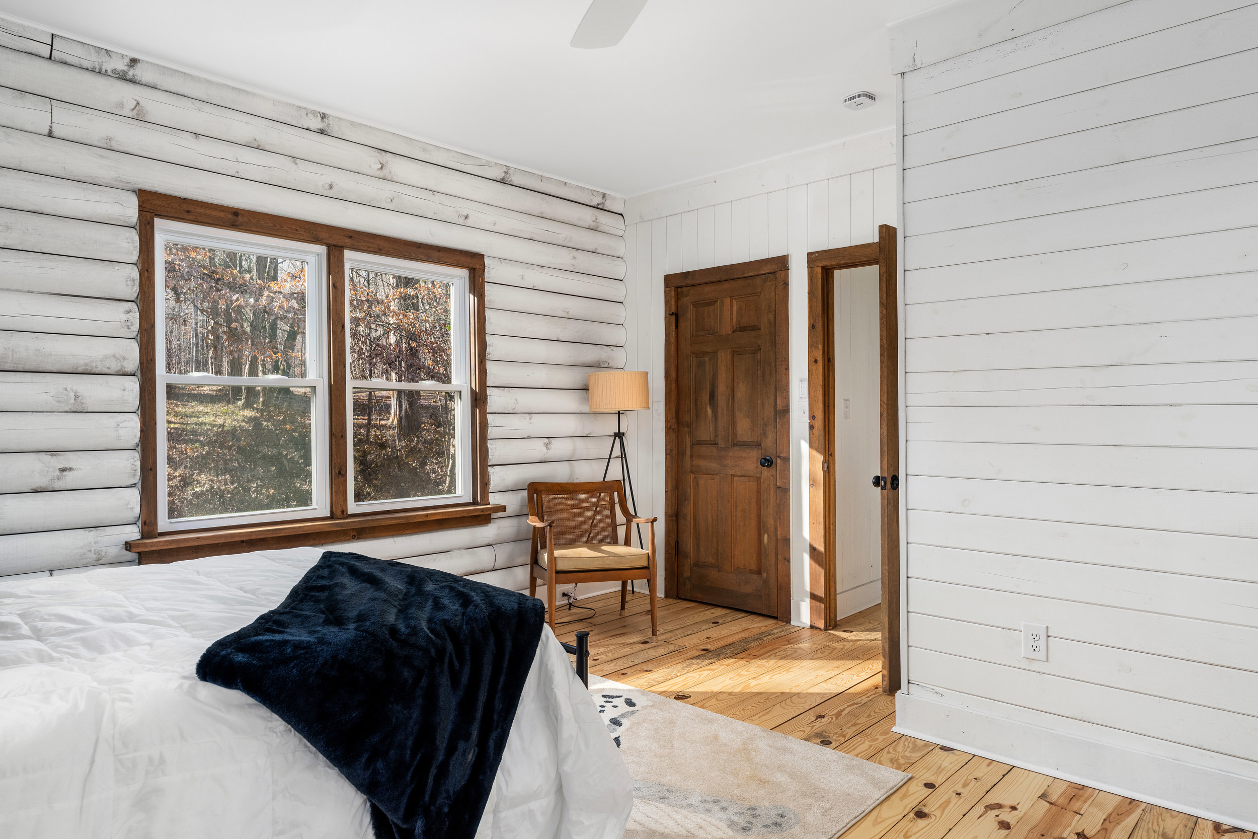 Bedroom 2: Sunlit space with rustic charm and serene views—perfect for relaxation!