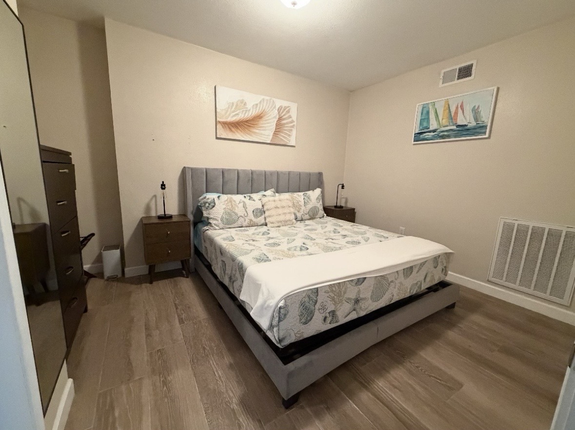 Main level bedroom 1: King bedroom.   Note: There is no bathroom at the main level or lower level.  You have to go upstairs to use the bathroom.
